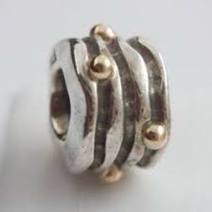 Pandora sterling and 14k gold bead